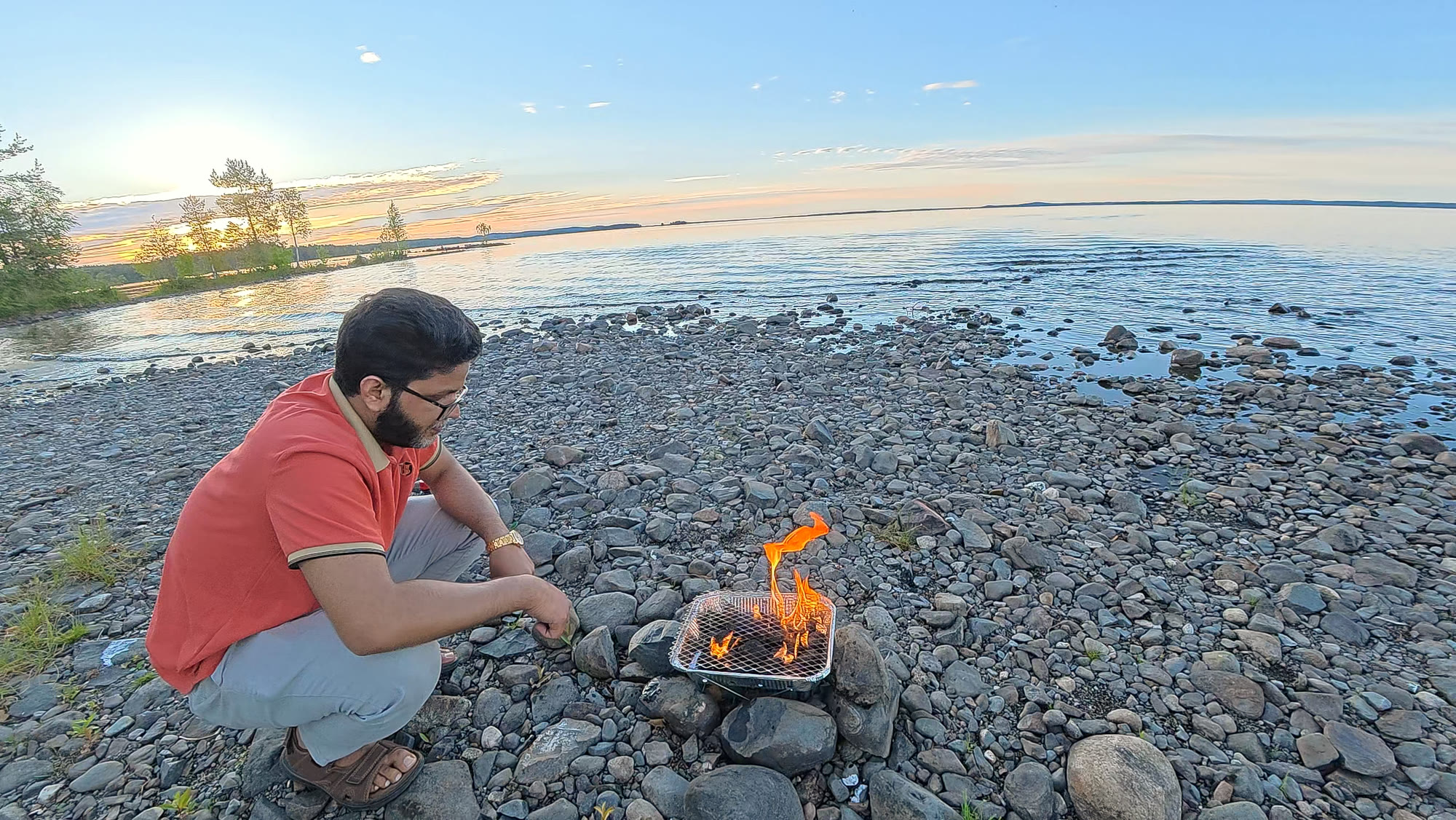 A golden-hour lakeside BBQ picnic in Joensuu